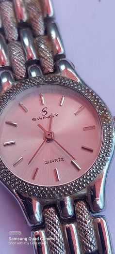 ladies watch swing quartz ,working prefect,,price includes post to anywhere in Ireland thank you, see pictures for condition, used