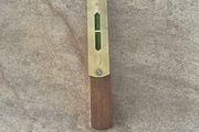 Vintage wooden and brass spirit level