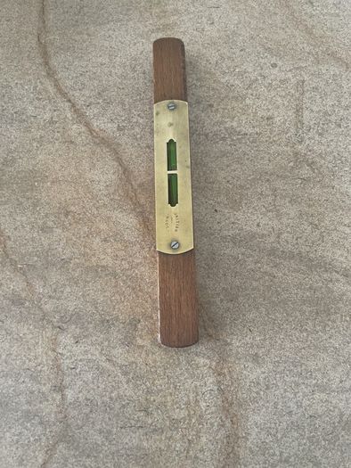 Vintage wooden and brass spirit level
