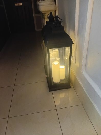 Floor lanterns standing 27 ins high and 21 ins width