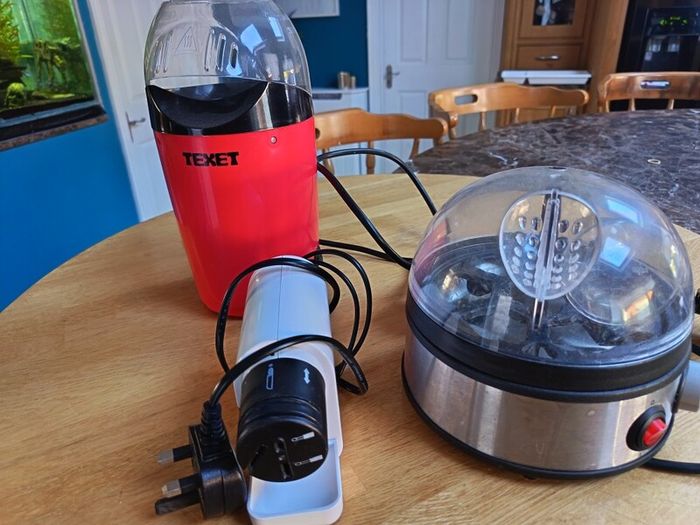Popcorn maker, egg boiler and knife sharpener