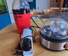 Popcorn maker, egg boiler and knife sharpener