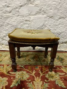 Vintage oak framed footstool with tapestry cushion.