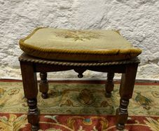 Vintage oak framed footstool with tapestry cushion.