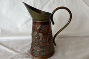 Copper and brass ornamental jug