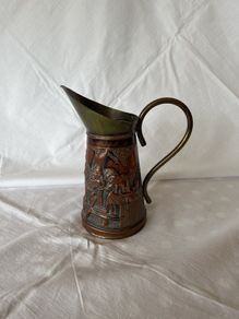 Copper and brass ornamental jug