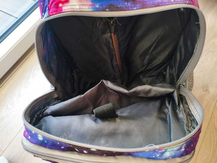 Galaxy print rolling backpack with extendable handle