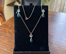silver pendent and earring set