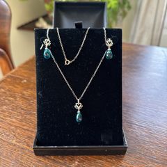 silver pendent and earring set