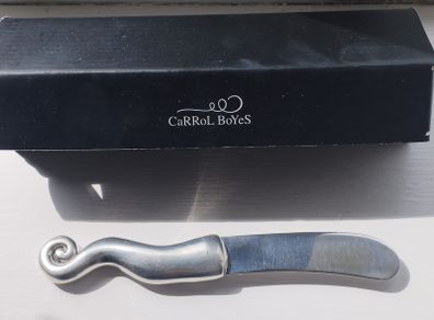 A collectible knife made of polished pewter with a stainless steel blade from Carrol Boyes.