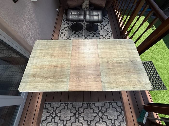 Swivel armchairs with foot rest , table