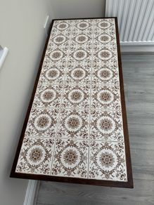 Tiled Mid century mahogany coffee table.