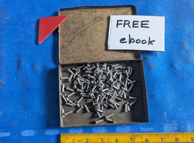 100 Rivets in a Cigarette Tin.