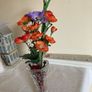 A collection of Artificial Flowers . Image 4