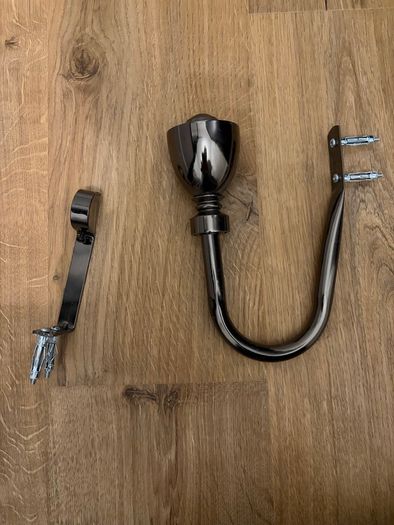 Grey curtains with extensible curtain pole
