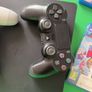 playstation 4 with two controllers and games Image 3
