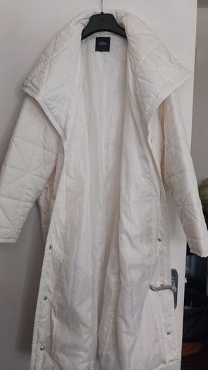 Capsule White Quilted Longline Coat.