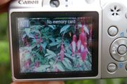 Canon PowerShot A1100 IS 12.1MP Digital Camera - Silver Tested Works well