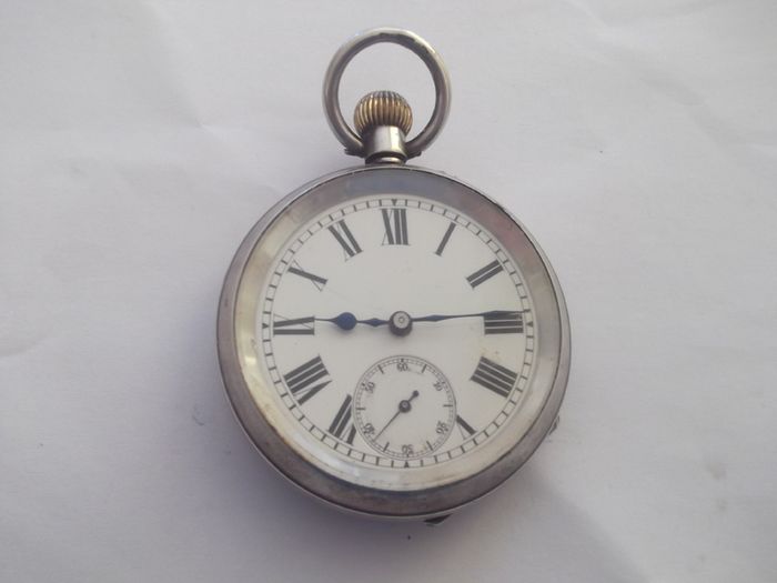 a antique open face solid silver pocket watch
