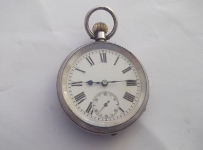 a antique open face solid silver pocket watch