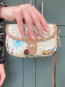 Dooney & Bourke x Disney collectable wristlet