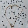 925 sterling silver bracelet with yellow gold plating and V shaped pendant. Image 2