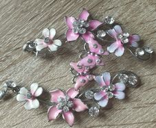 Beautiful earrings for pierced ears in pink tones with rhinestones and enamel.