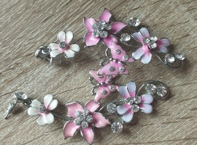 Beautiful earrings for pierced ears in pink tones with rhinestones and enamel.