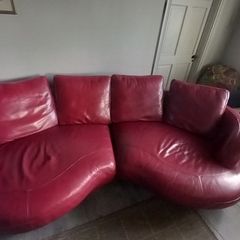 Red Leather curved sofa.. very large!