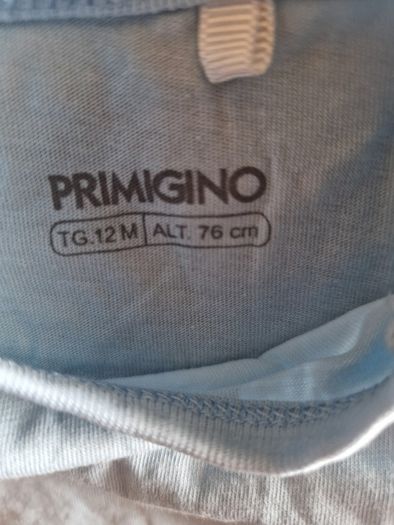 A selection of brand new baby clothes and items