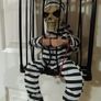 Halloween decorations. Freak in a cage. Image 3
