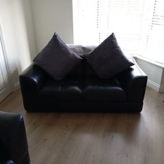 3 seater and 2 seater black leather sofas for sale