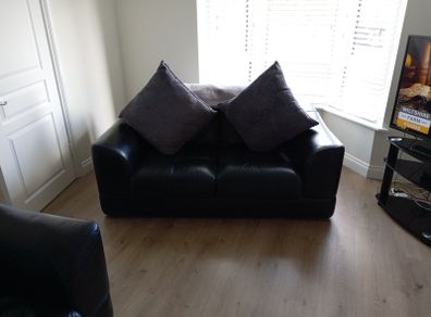 3 seater and 2 seater black leather sofas for sale