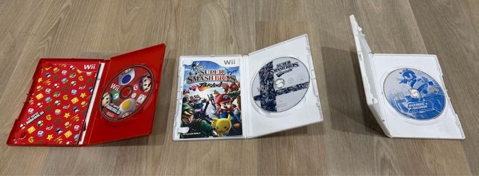 Wii games bundle - Mario bros Wii, Smash Bros Brawl, and Sonic Riders
