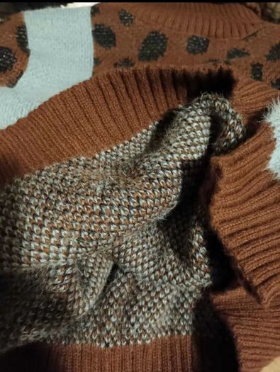 Ribbed lose leopard print polo neck jumper