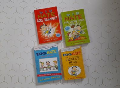 Big Nate goes bananas. Big Nate the crowdgoes wild. Big Nate here goes nothing. Big Nate the boy with the biggest head.
