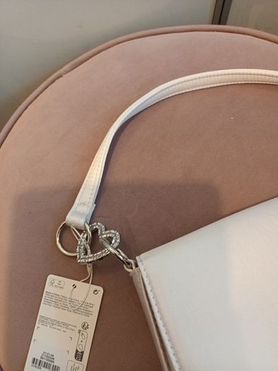 Brand new satin cream occassion bag