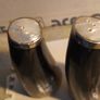 Set of 2 Buffalo Horn  Salt And Pepper Set topped with mother of pearl rimmed with sterling silver rim stamped. Image 2