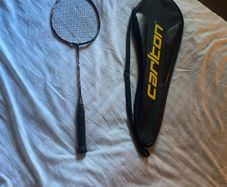 Yonnex Astrox 100 GAME, custom stung (Bg 65 black) @ 12.5kg tension. Factory grip