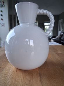 White ceramic vase with rope-style handle