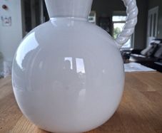 White ceramic vase with rope-style handle