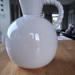 White ceramic vase with rope-style handle