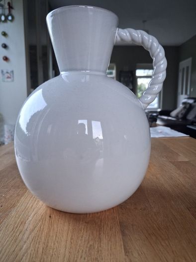 White ceramic vase with rope-style handle