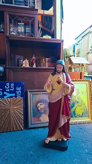 Antique holy statue and pictures