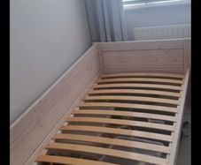 single wooden bed