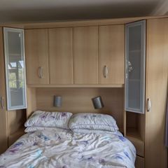 Bed surround wardrobe