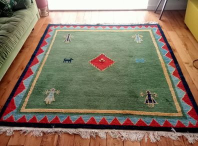 hand-knotted green Gabbeh rug