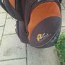 2 golf bags and various  club also jackets balls and tees shoes  and a trolly Image 2
