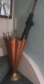 Copper and brass umbrella stand.