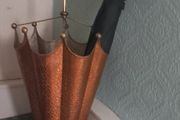 Copper and brass umbrella stand.